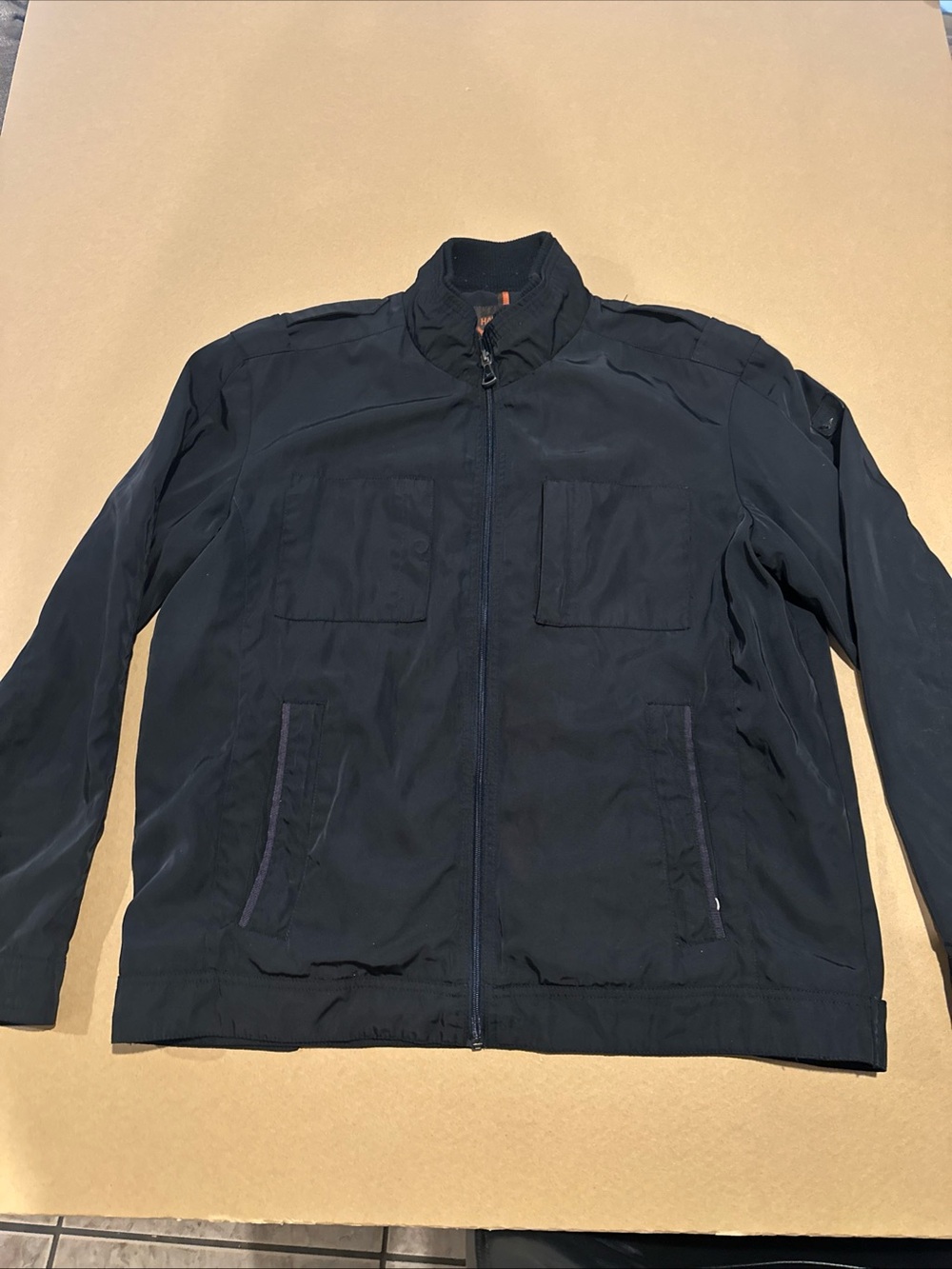 Men's Black Hawke & Co. black jacket with orange accents full zipper